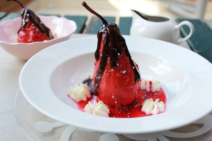 poached pears in raspberry and chocolate sauce