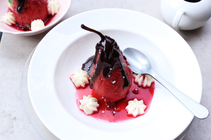 poached pears in raspberry and chocolate sauce