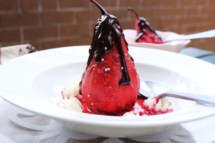 poached pears in raspberry and chocolate sauce