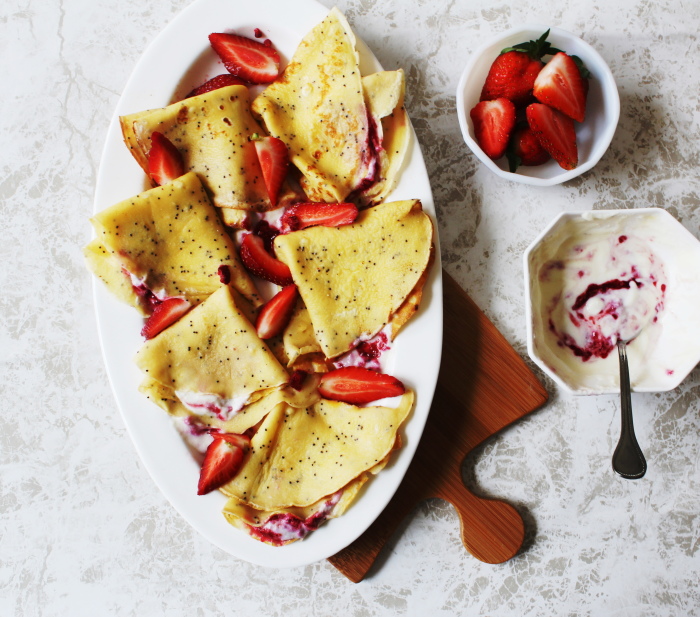 poppy seed crepes with strawberries and yogurt