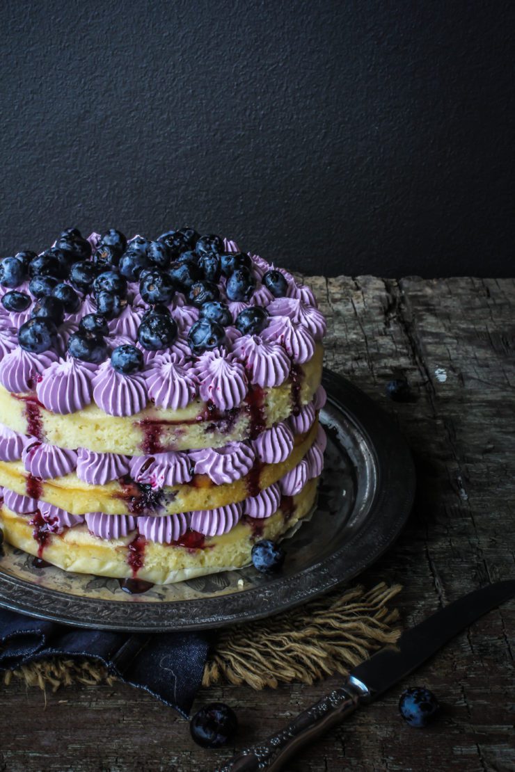 blueberry cake with blueberry jam and blueberry buttercream