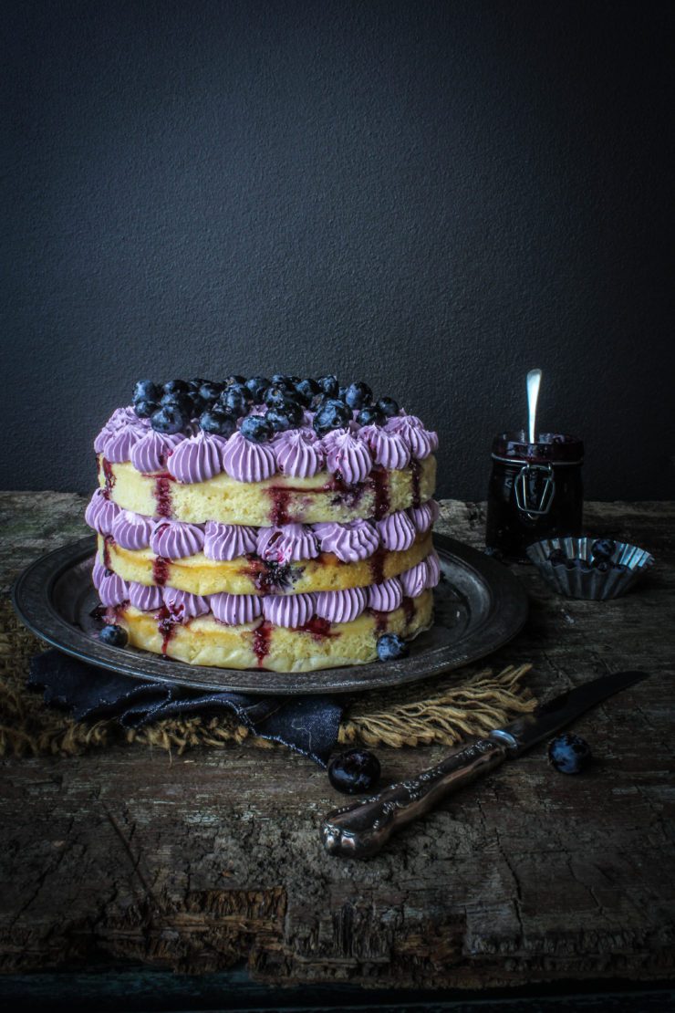 blueberry cake with blueberry jam and blueberry buttercream